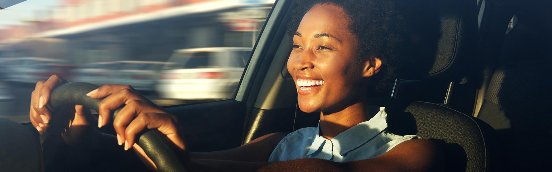 woman driving Kemna CDJR Center in Algona IA